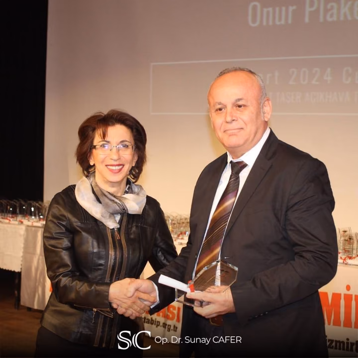 Op. Dr. Sunay Cafer at a professional ceremony